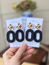 Load image into Gallery viewer, Statement Black - Oval & Gold Flower Post